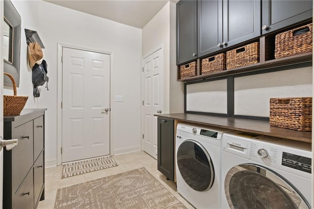 410 Longwood Ln, Alpharetta, GA 30004 - clothes washing area featuring cabinet space, independent washer and dryer, light tile patterned floors, and baseboards