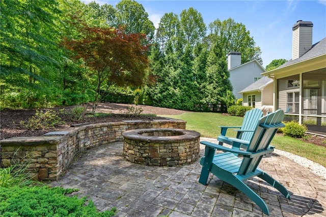 410 Longwood Ln, Alpharetta, GA 30004 - view of patio / terrace with an outdoor fire pit and a sunroom