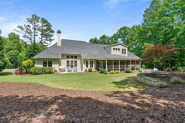 410 Longwood Ln, Alpharetta, GA 30004 - rear view of house with a sunroom, a patio area, a chimney, and a yard