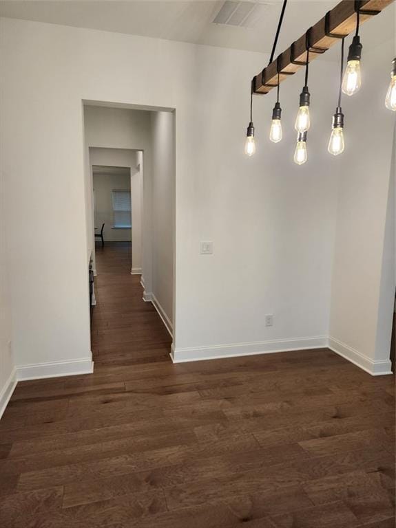 2949 Longbush, Duluth, GA 30097 - unfurnished dining area with baseboards and dark wood-style flooring