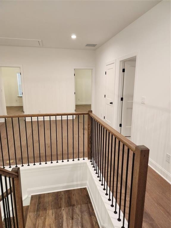 2949 Longbush, Duluth, GA 30097 - stairs featuring attic access, wood finished floors, recessed lighting, and baseboards