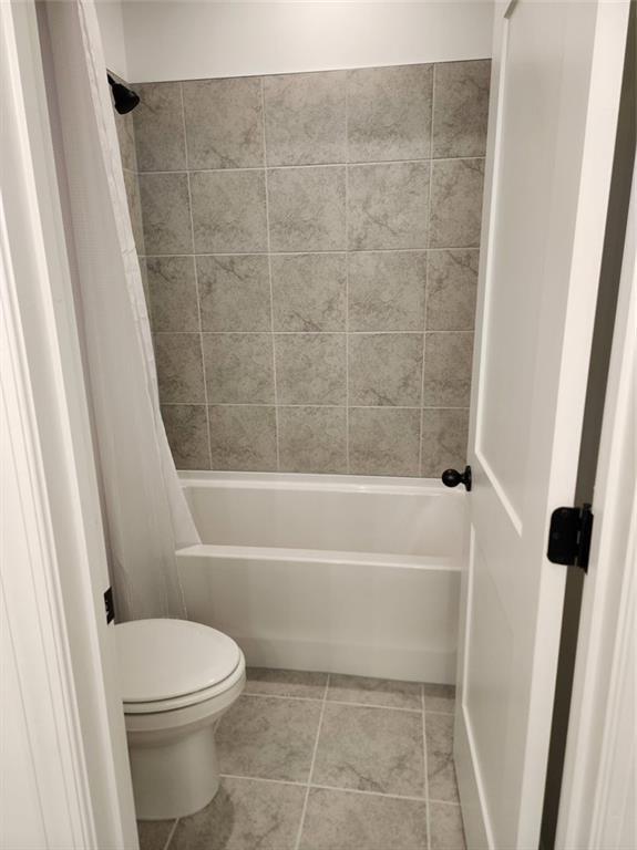 2949 Longbush, Duluth, GA 30097 - full bathroom with toilet, shower / bath combo, and tile patterned flooring