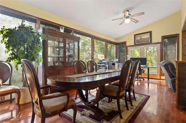 sunroom featuring a wealth of natural light, vaulted ceiling, and ceiling fan