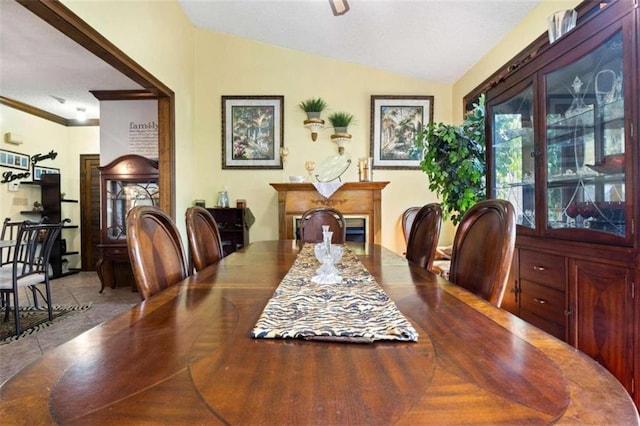 dining room featuring lofted ceiling