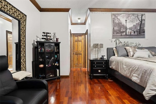 bedroom featuring a textured ceiling, dark hardwood / wood-style floors, and ornamental molding