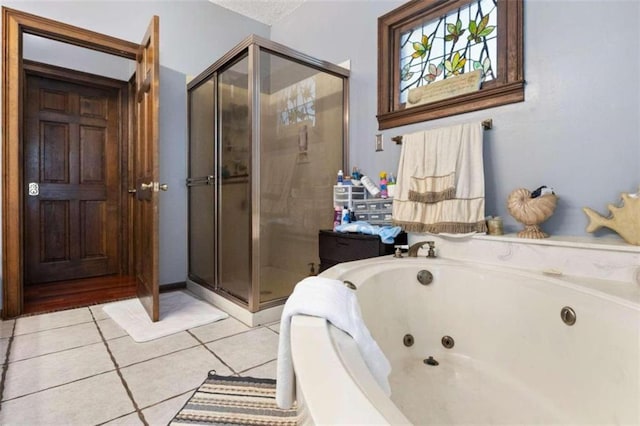 bathroom with tile patterned flooring and plus walk in shower