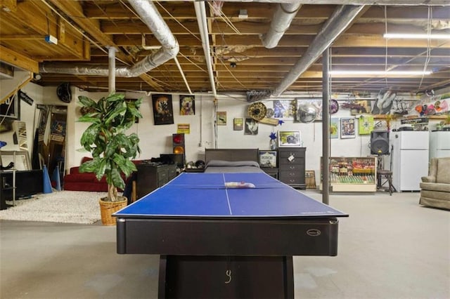 game room with pool table and concrete floors