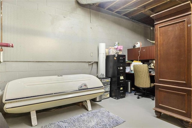 bedroom with concrete flooring