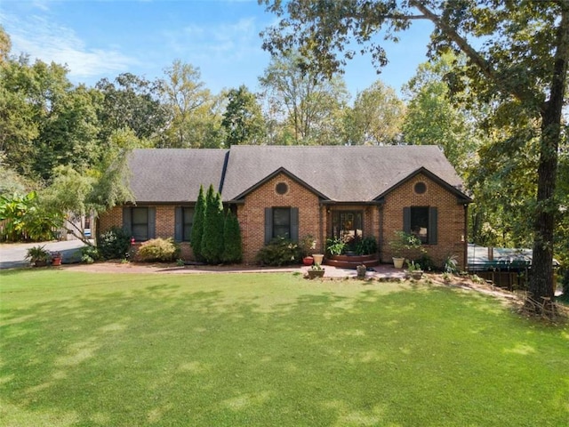 single story home with a front yard