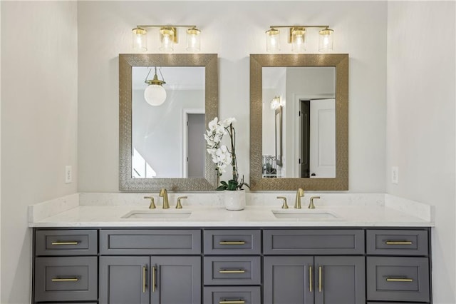 bathroom featuring double vanity and a sink