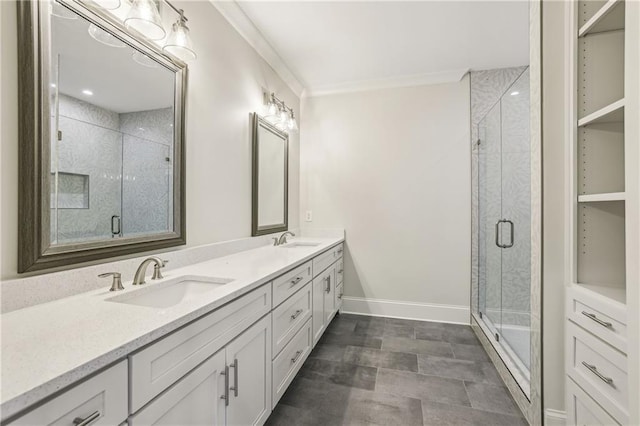 full bathroom featuring double vanity, a stall shower, and a sink