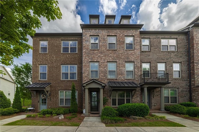 multi unit property featuring brick siding