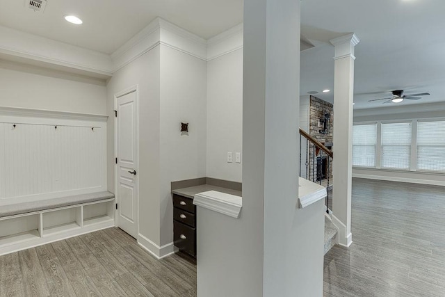 mudroom with a ceiling fan, wood finished floors, baseboards, recessed lighting, and crown molding