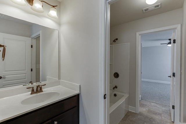 bathroom featuring visible vents, vanity, shower / bathing tub combination, and baseboards