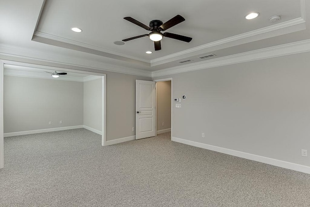 empty room featuring visible vents, baseboards, light carpet, and a ceiling fan