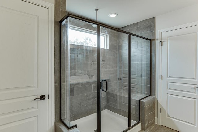 bathroom featuring a stall shower