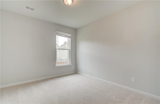 empty room with carpet floors