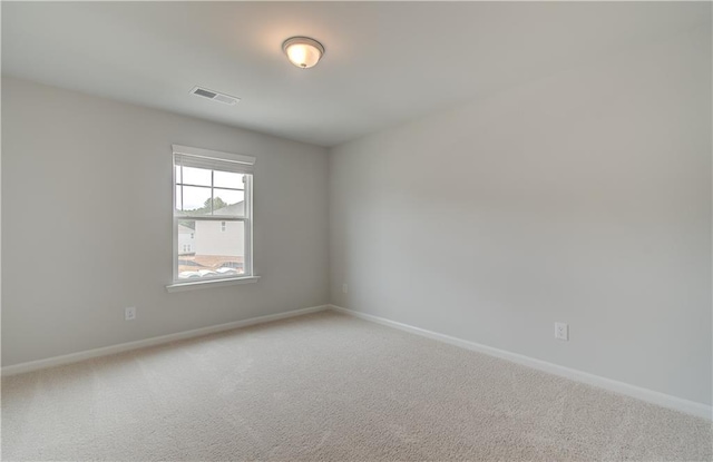 unfurnished room with carpet