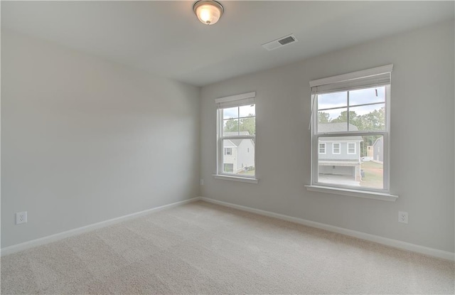 spare room with carpet floors