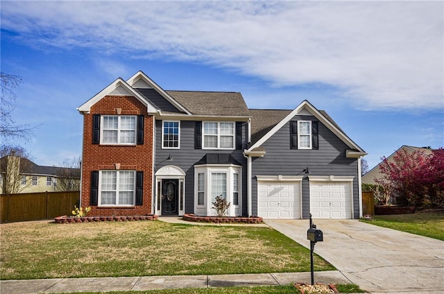 view of front of house with a front lawn and a garage