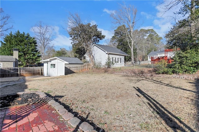 view of yard with a patio and a shed