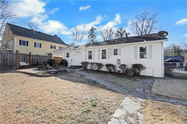 back of house featuring a patio area