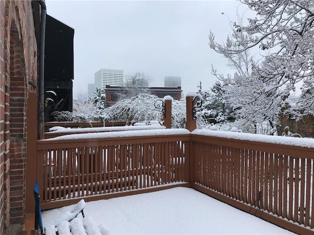 view of snow covered deck