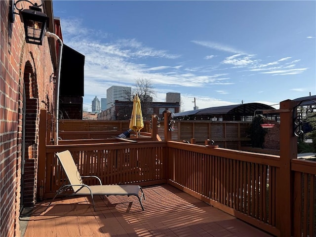 deck featuring a city view