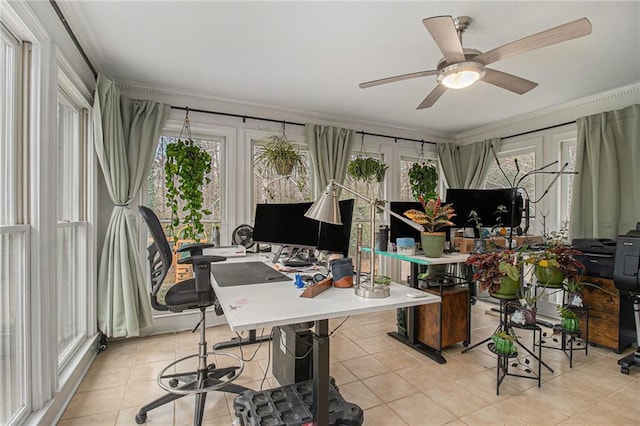 home office with light tile patterned floors and a ceiling fan