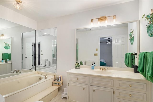 ensuite bathroom with tile patterned floors, ensuite bath, a bath, and vanity