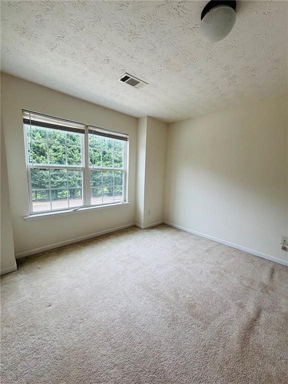 5421 Skylar Creek Ln, Buford, GA 30518 - carpeted spare room featuring a textured ceiling and baseboards