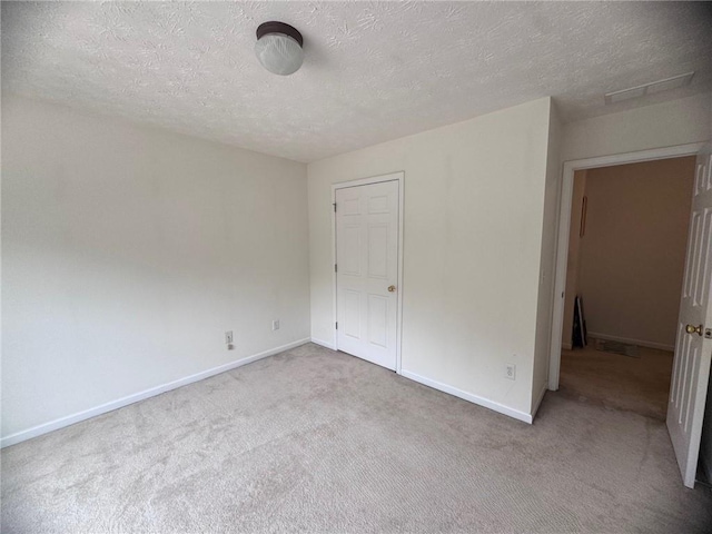 5421 Skylar Creek Ln, Buford, GA 30518 - unfurnished bedroom with carpet floors and a textured ceiling