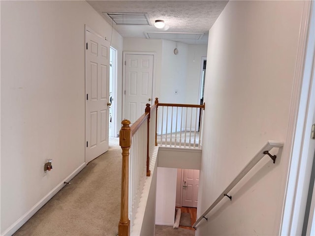 5421 Skylar Creek Ln, Buford, GA 30518 - staircase featuring carpet floors and attic access