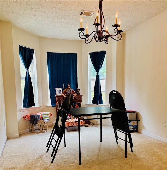 5421 Skylar Creek Ln, Buford, GA 30518 - playroom with a chandelier, carpet, and a textured ceiling
