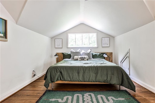 1136 Moreland Pl SE, Atlanta, GA 30316 - bedroom with vaulted ceiling, wood finished floors, and baseboards