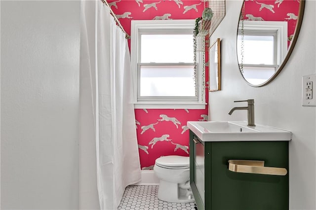 1136 Moreland Pl SE, Atlanta, GA 30316 - bathroom featuring toilet, vanity, tile patterned flooring, and curtained shower
