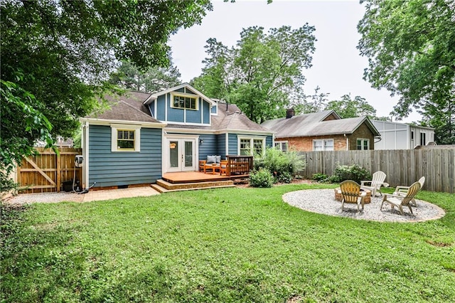 1136 Moreland Pl SE, Atlanta, GA 30316 - rear view of property with french doors, a wooden deck, and a fire pit