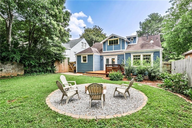 1136 Moreland Pl SE, Atlanta, GA 30316 - rear view of property featuring a wooden deck, a fire pit, french doors, and a patio