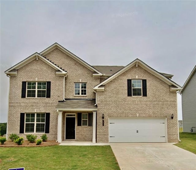 craftsman-style home with a garage and a front yard