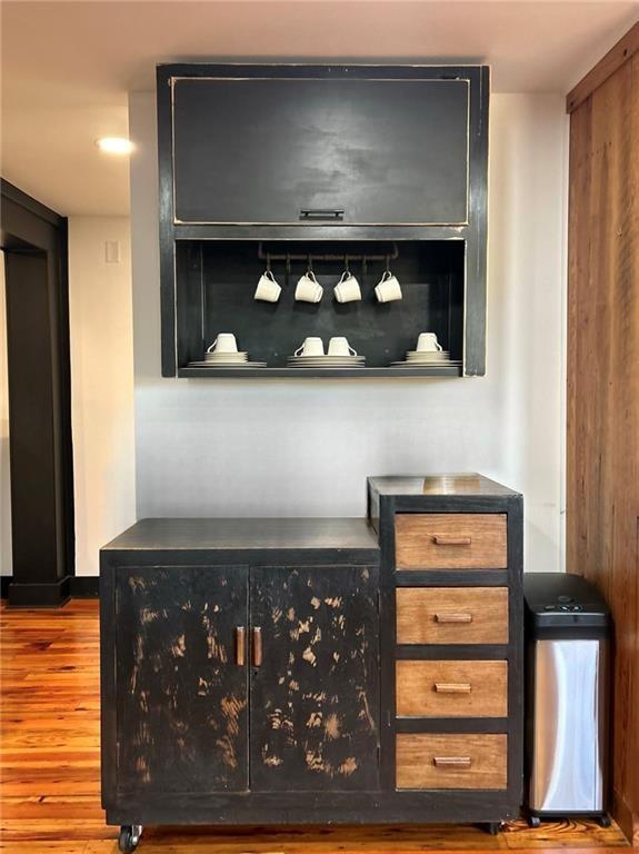 bar with wood finished floors