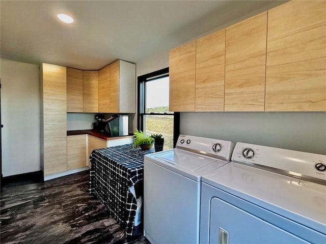 laundry room with recessed lighting, washer and dryer, cabinet space, and baseboards