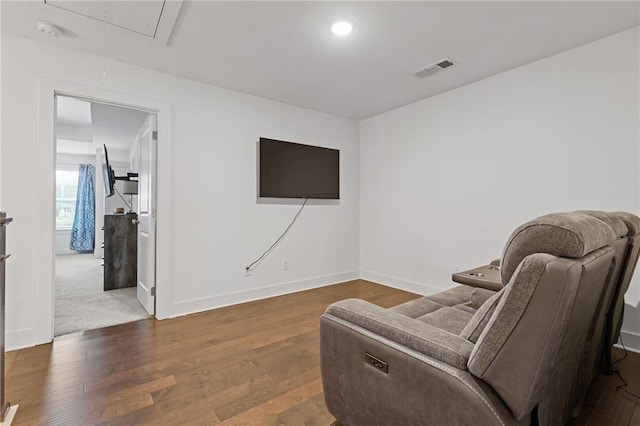 living area with dark hardwood / wood-style floors