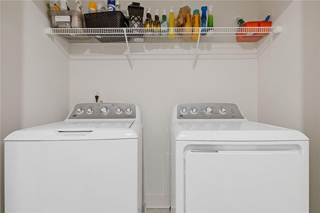 washroom with washer and clothes dryer