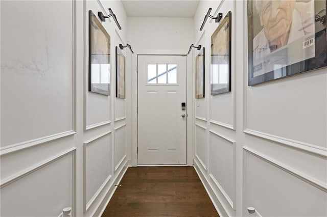 doorway to outside featuring dark hardwood / wood-style floors