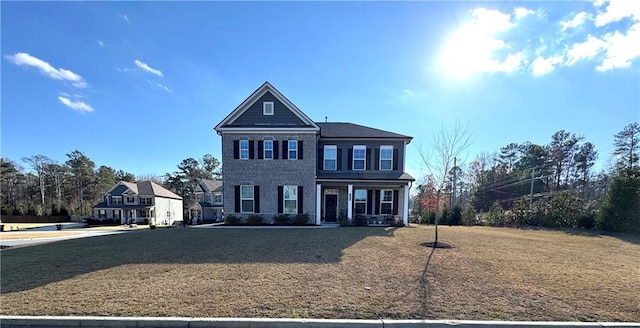 view of front of property with a front lawn