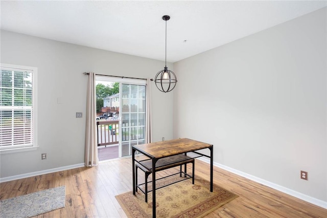 1122 Cotton Gin Dr, Woodstock, GA 30188 - dining room with light wood-type flooring and baseboards