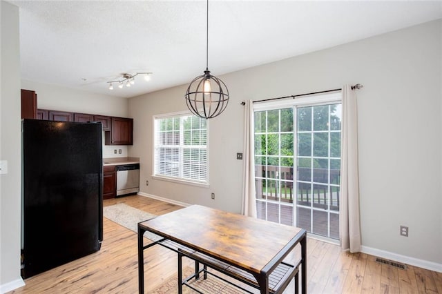 1122 Cotton Gin Dr, Woodstock, GA 30188 - dining space featuring baseboards and light wood finished floors