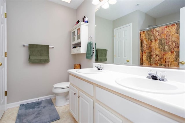 1122 Cotton Gin Dr, Woodstock, GA 30188 - bathroom featuring double vanity, toilet, tile patterned flooring, baseboards, and a shower with curtain