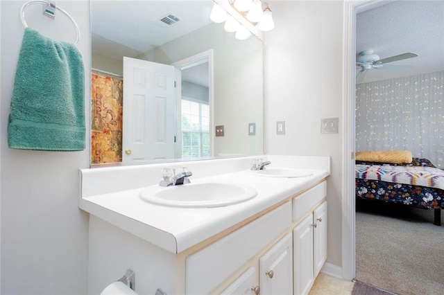 1122 Cotton Gin Dr, Woodstock, GA 30188 - bathroom featuring double vanity, ensuite bath, and ceiling fan