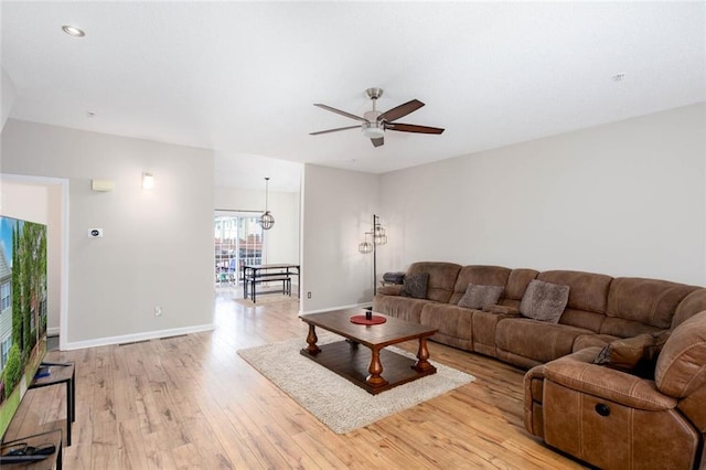 1122 Cotton Gin Dr, Woodstock, GA 30188 - living room featuring ceiling fan, light wood-type flooring, and baseboards